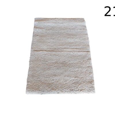 Long pile shaggy carpet in beige colour for rent for events, advertising, movies and series.