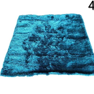 Benuta Whisper long pile carpet in turquoise colour for rent for events, advertising, movies and series.