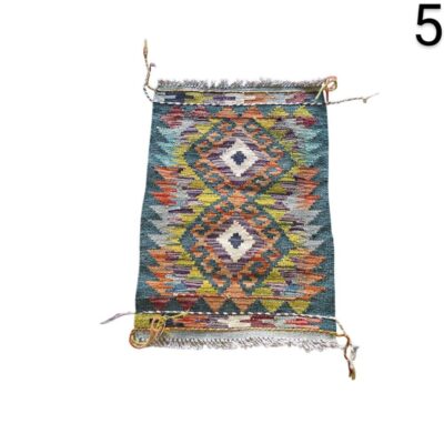 Alfombra Kilim afgana hecha a mano con un patrón geométrico de diamantes en tonos verde azulado, naranja y multicolor alquiler para eventos, publicidad, peliculas y series