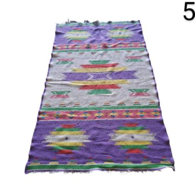 Alfombra tipo kilim tejida a mano con patrones geométricos multicolores alquiler para eventos, publicidad, peliculas y series