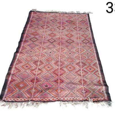 Handmade vintage kilim rug, possibly of Moroccan or Turkish origin, for rent for events, advertising, films and series.