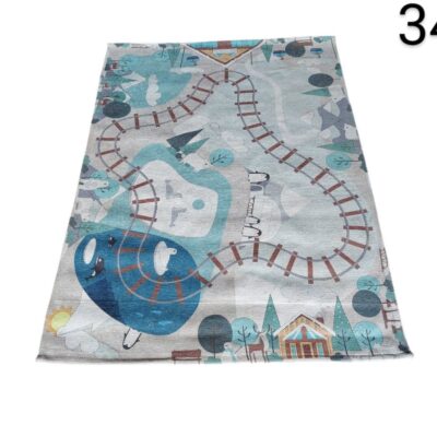 Leroy Merlin JUNIOR washable carpet with train tracks design for children in blue for rent for events, advertising, movies and series.