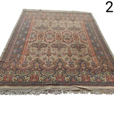 Beige antique Persian carpet with multicoloured floral motifs for rent for events, advertising, films and series.
