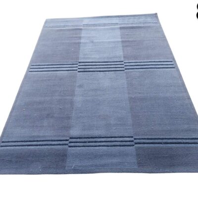 Rectangular blue and grey flat weave carpet with dark horizontal lines for rent for events, advertising, films and series.