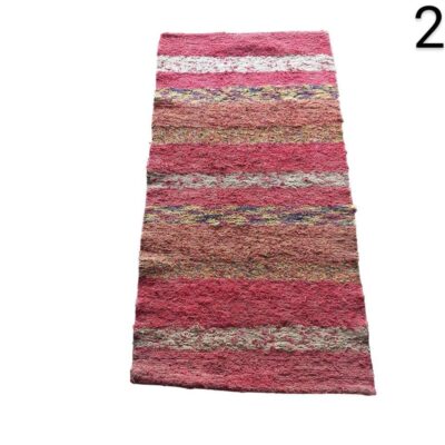 Handmade rag carpet in pink and multicoloured tones, with a striped design, for rent for events, advertising, films and series.