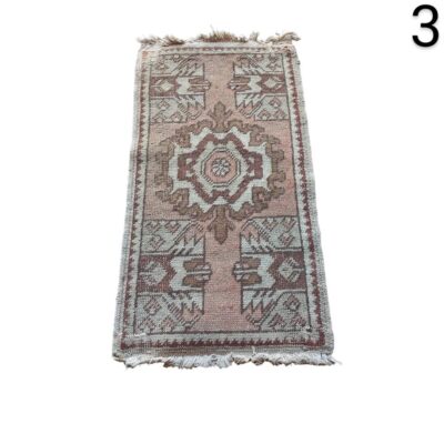 Oushak style vintage turkish carpet with pink and brown tones for rent for events, advertising, movies and series.