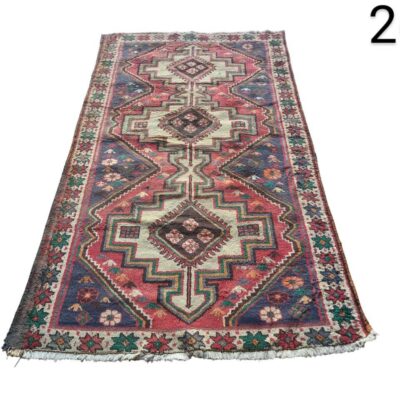 Vintage turkish wool rug with geometric design for rent for events, advertising, movies and series.